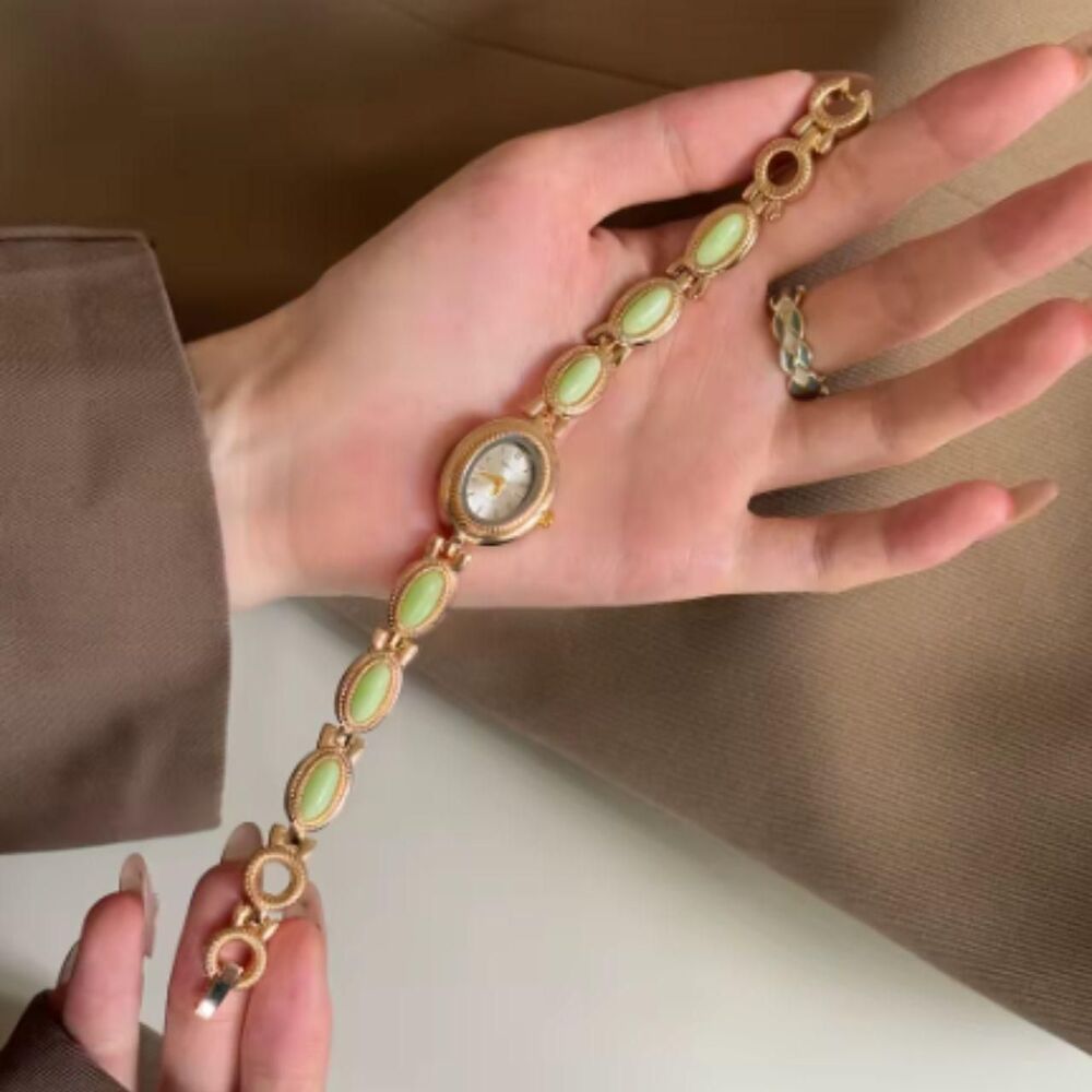 Luxury Women's Gold and Green Watch